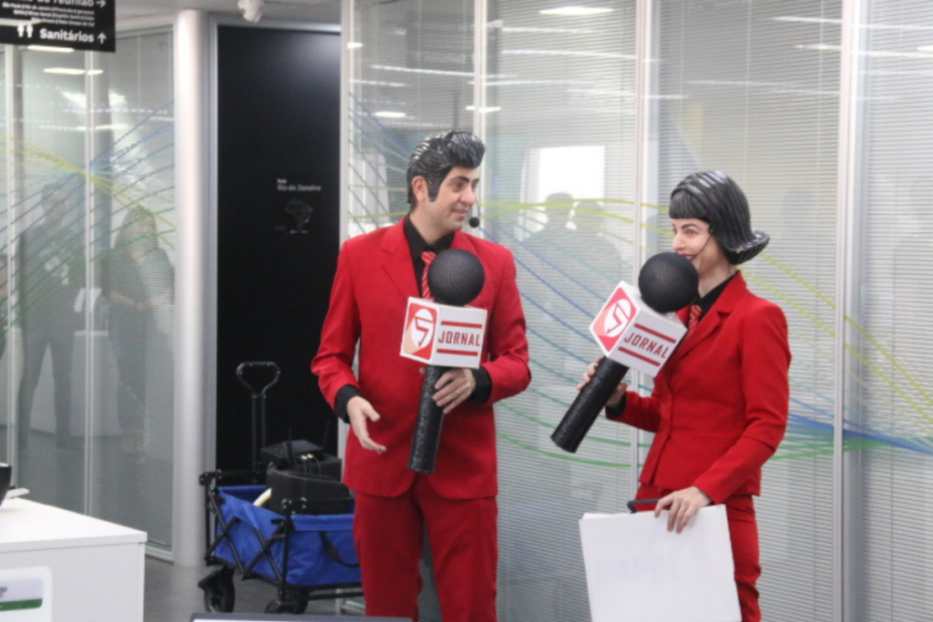 Palestrantes em evento corporativo